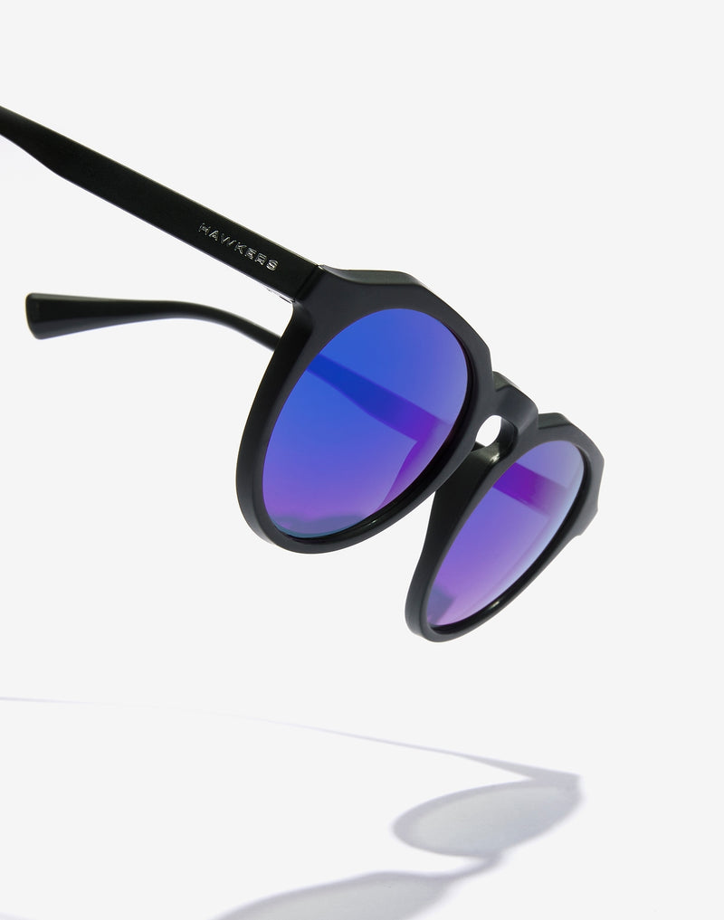 Lentes de Sol Hawkers Warwick Raw Carbon Black Sky